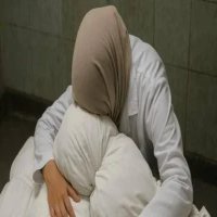 ﻿طبيبة فلسطينية تودع ابنائها التسعة بعد استشهادهم في غزة